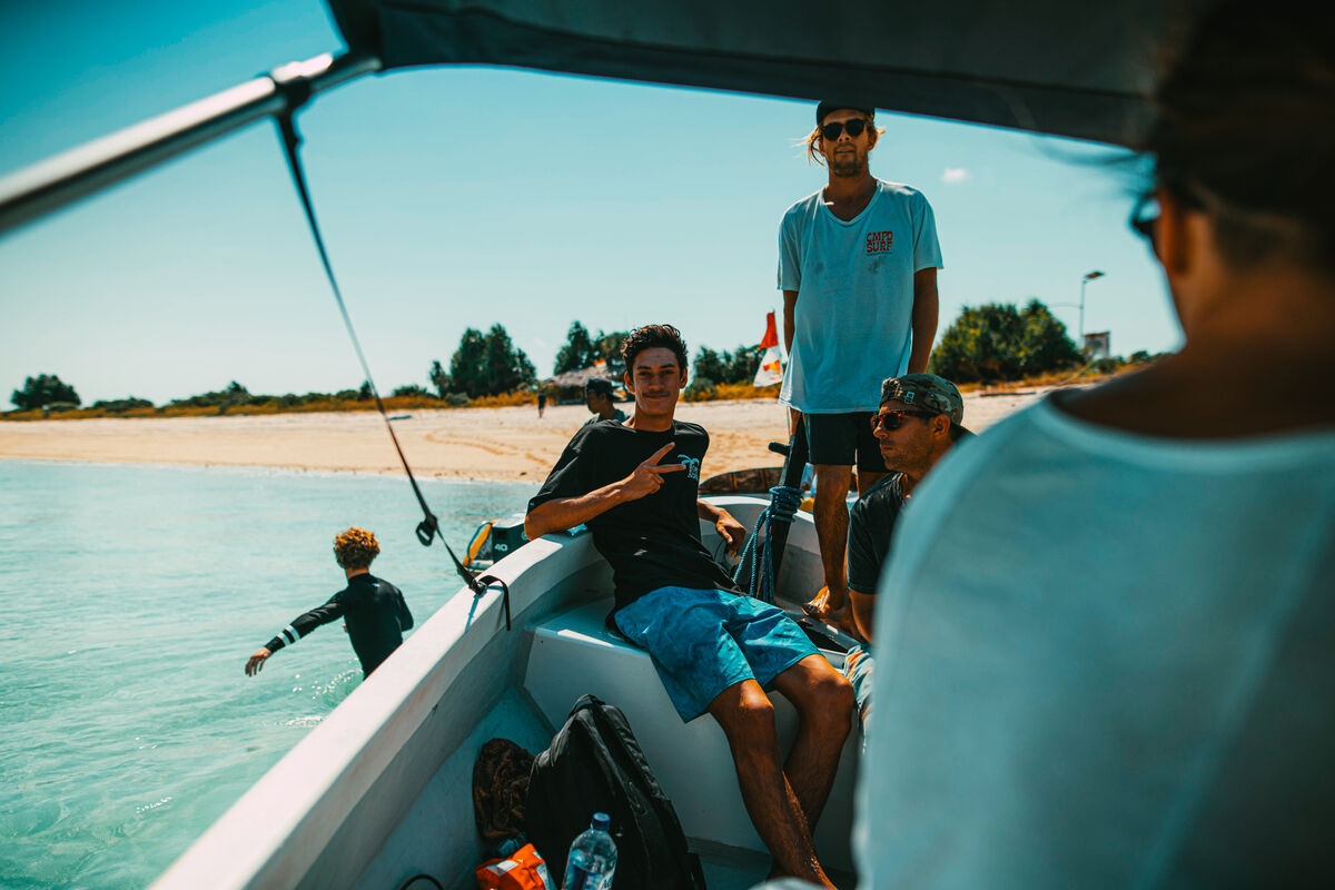 Crew heading out by boat along the Rote coast